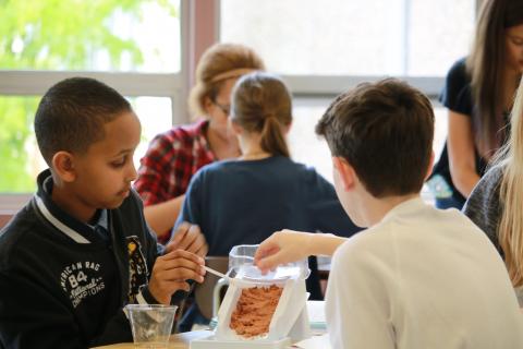 Kids working at a stream table